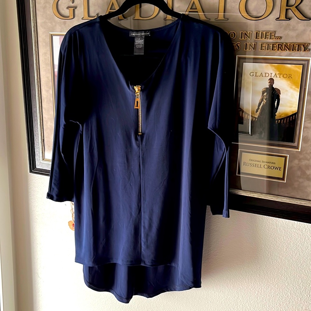Navy blue with gold zipper. Worn only once for two hours.😁 Navy blue